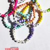 Braccialetto con perline colorate e logo vanity fair